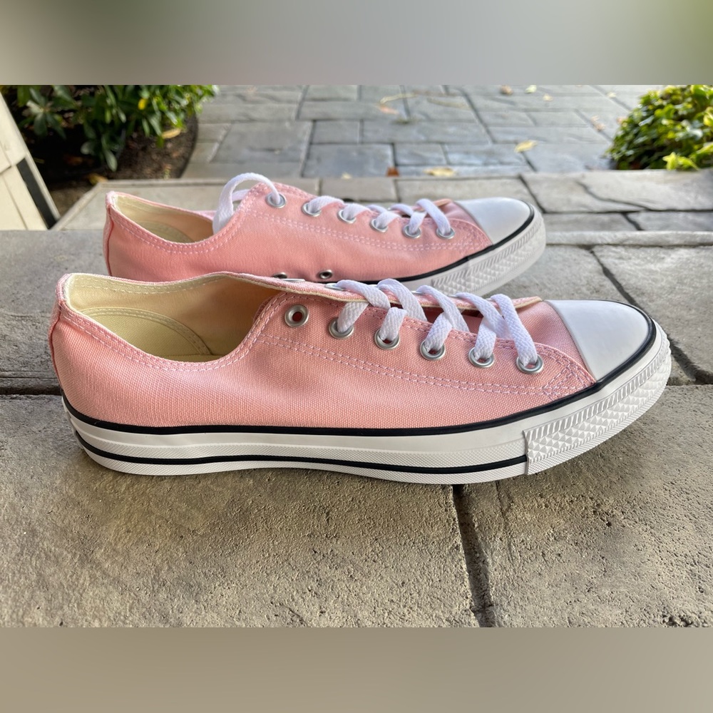 Women’s low top Converse size 9.5 storm pink